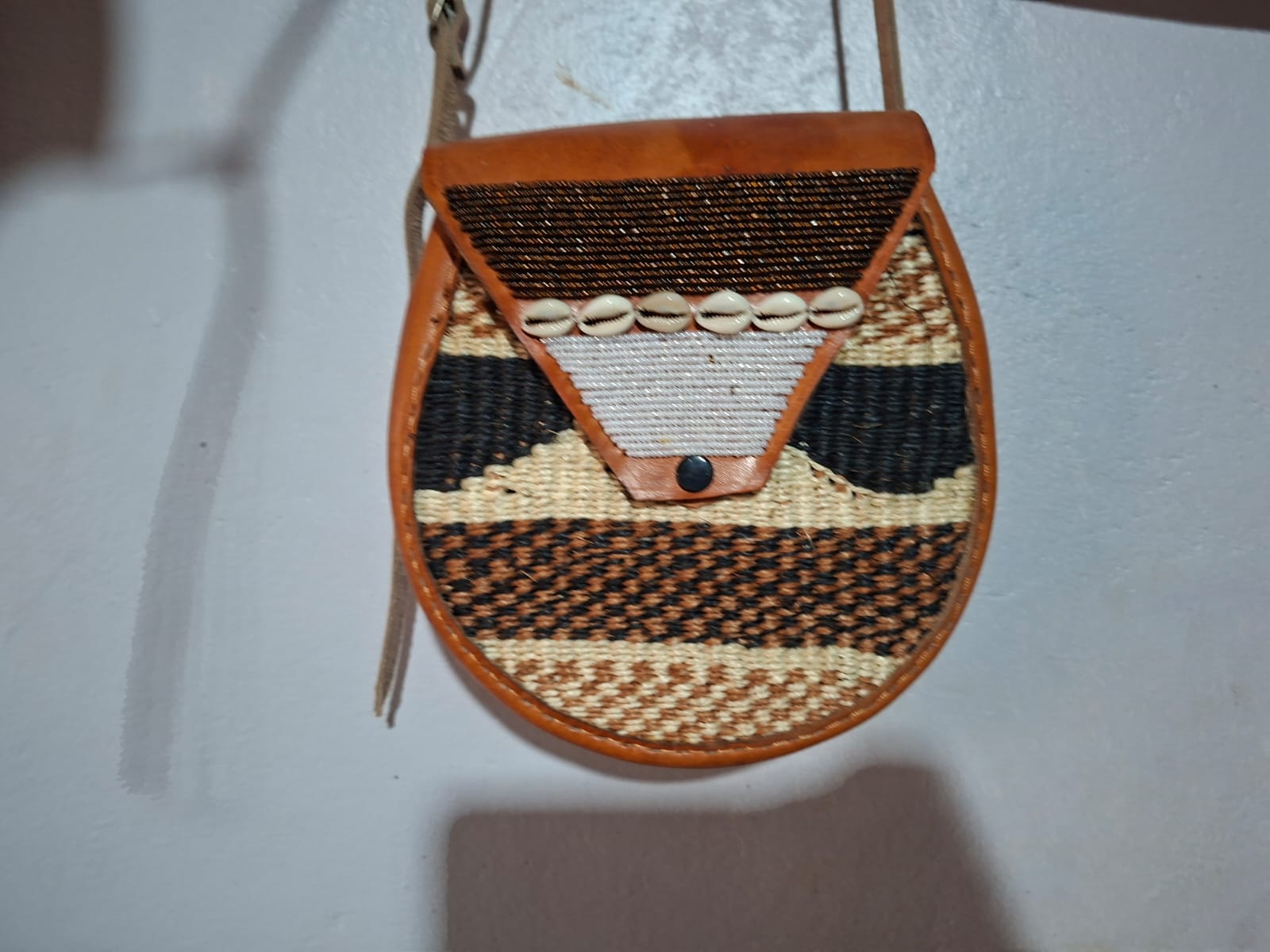 Kiondo/round bag with beads at KIVUVANI ENTERPRISES on MobileUza